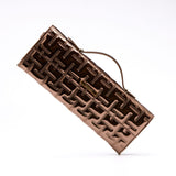 MAZE PURSE IN BRONZE